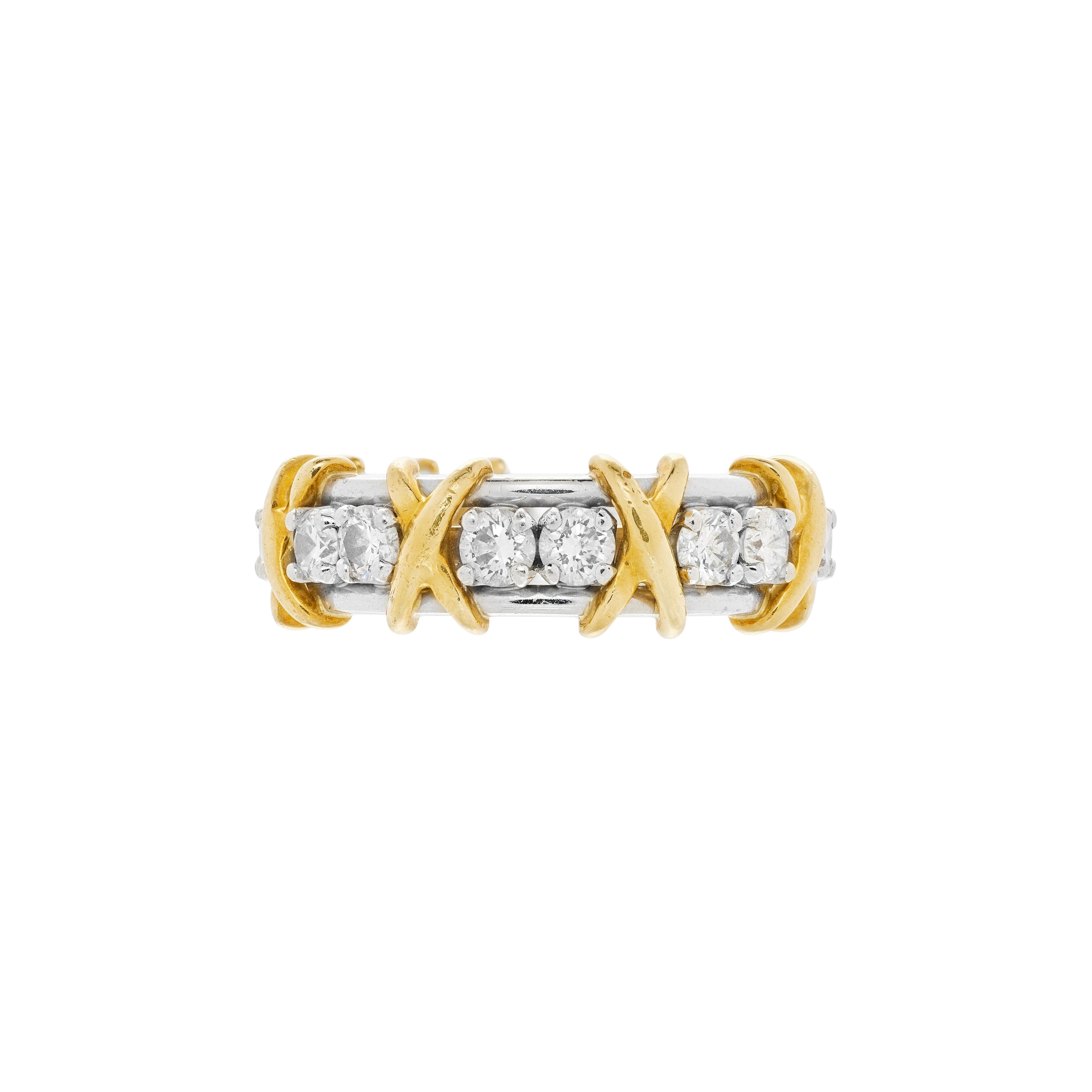 Platinum, Gold and Diamond Sixteen Stone Ring