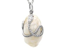Antique Saltwater Pearl, Ruby and Diamond, Platinum Snake Pendant